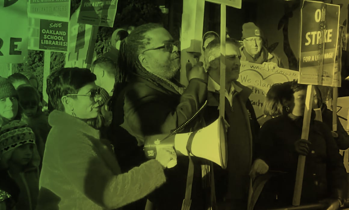 Oakland Education Association President Keith Brown speaks on the first day of the teachers strike