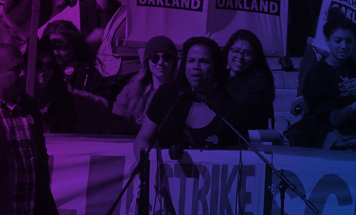 An Oakland Education Association teachers speaks at the OEA Strike Rally on the first day of the OEA strike