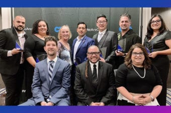 Seven award winners standing and three CTA officers seated at awards ceremony