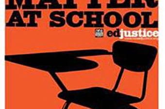 Empty desk with orange background Matters at School Ed Justice
