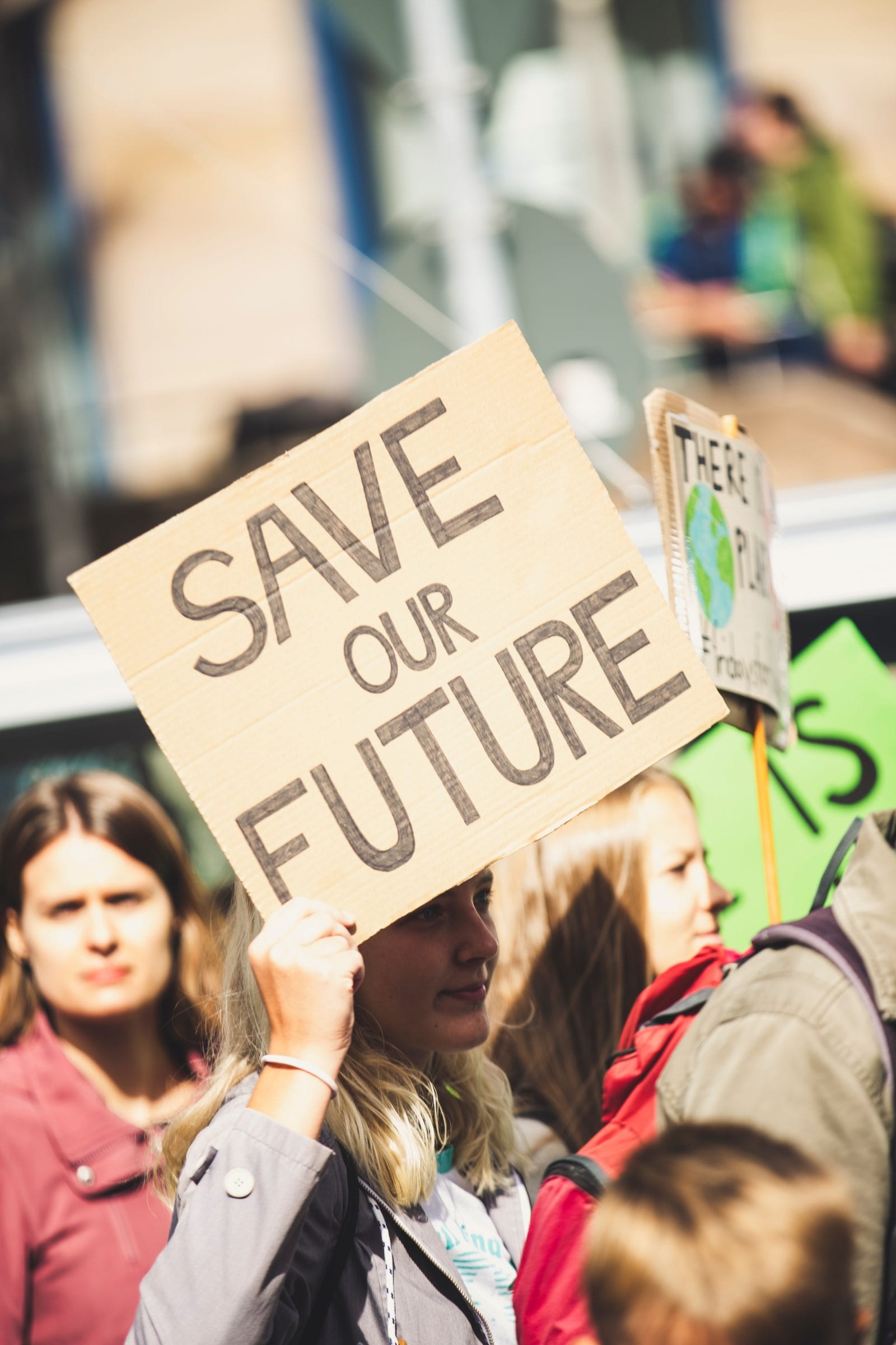 Protesters with sign "Save our future"