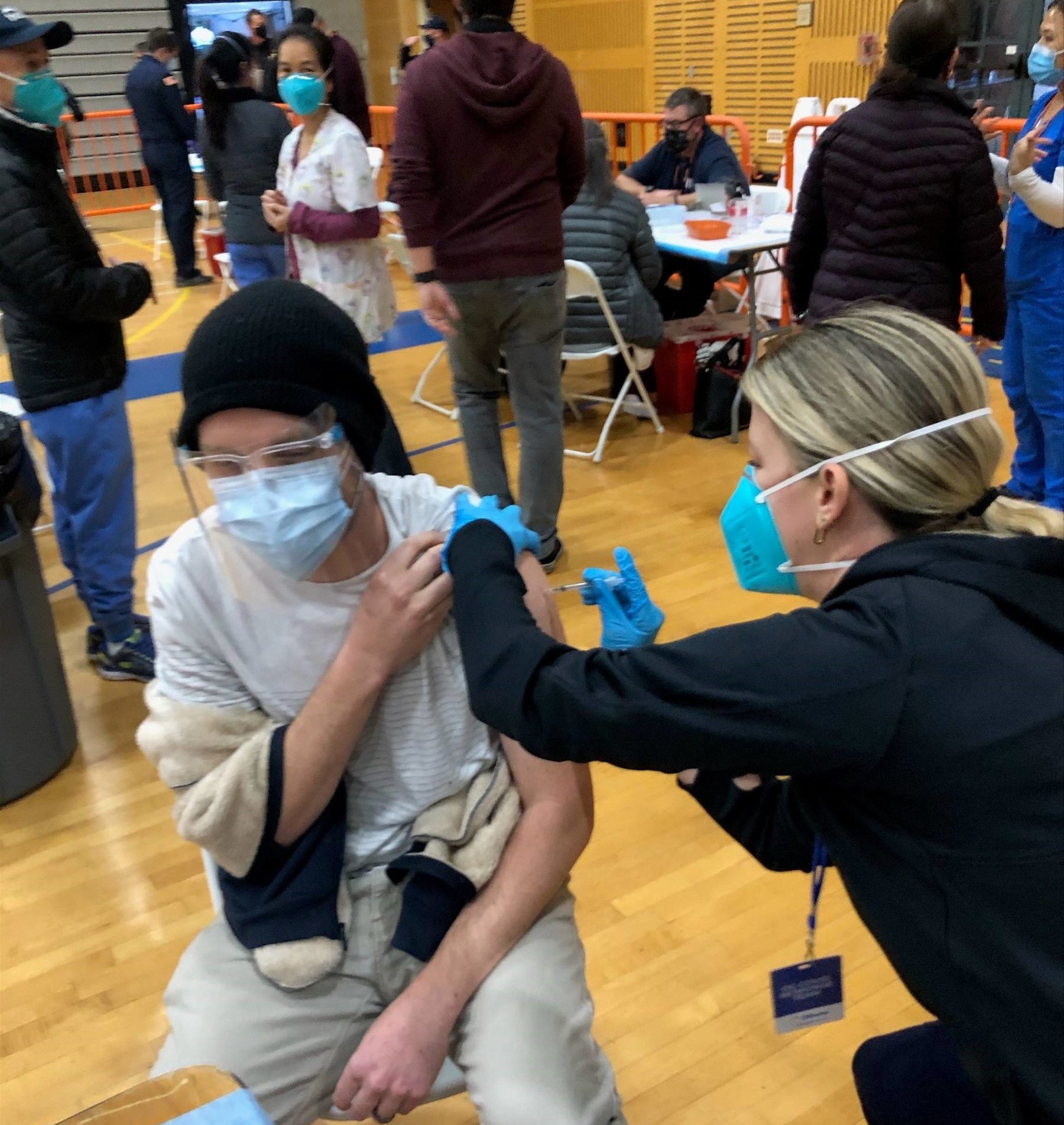 School nurse volunteers to give COVID-19 vaccines at Disneyland supersite