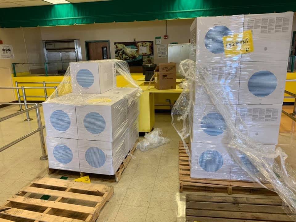 Several pallets of portable HEPA filters to improve indoor air quality in classrooms, offices, and other indoor spaces at Fremont High School. 