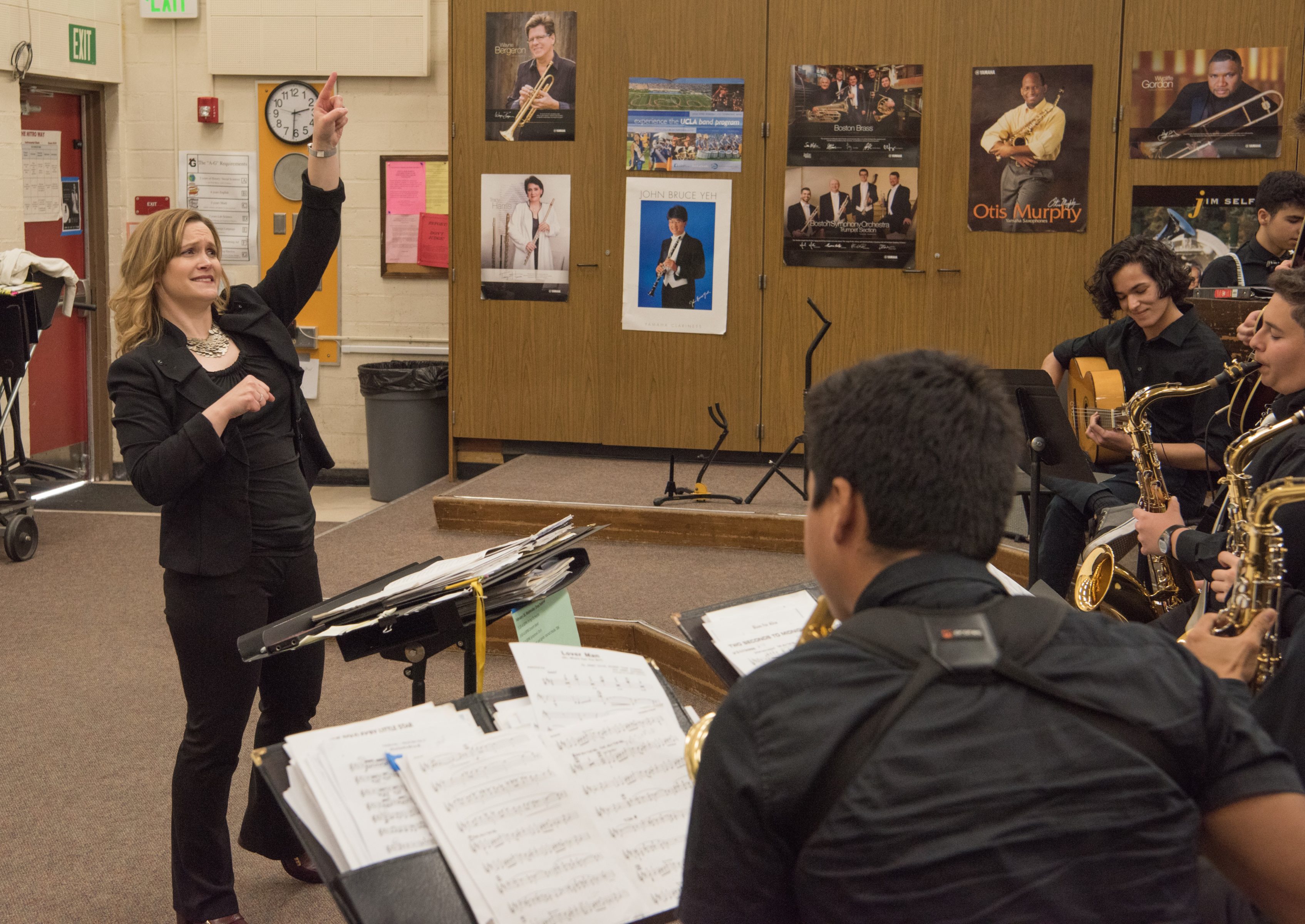 Amy Rangel conducting a student band