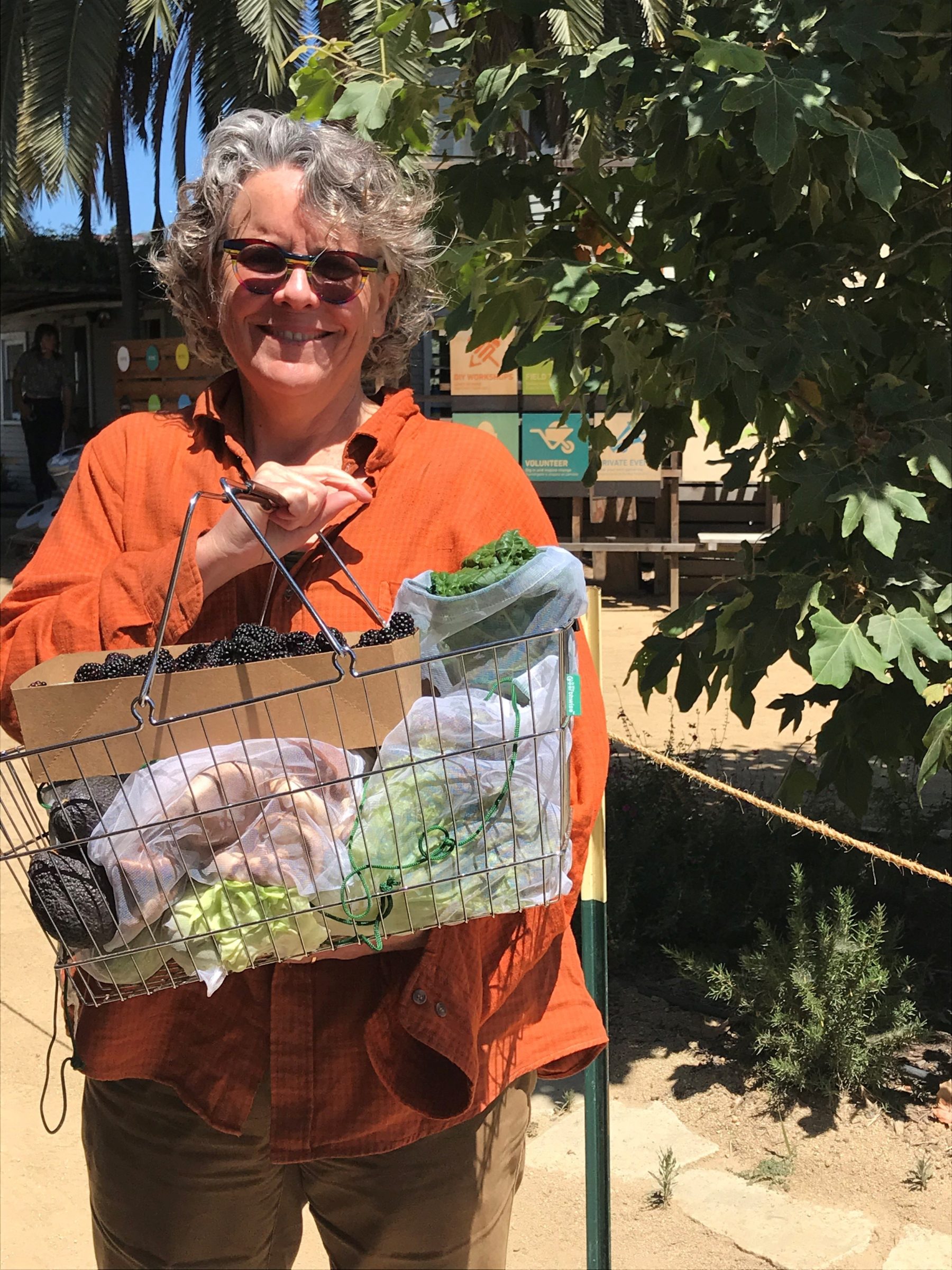 Betsy Black with grocery basket.