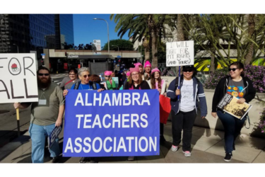 Teachers with Alhambra Teachers Association march for social justice.