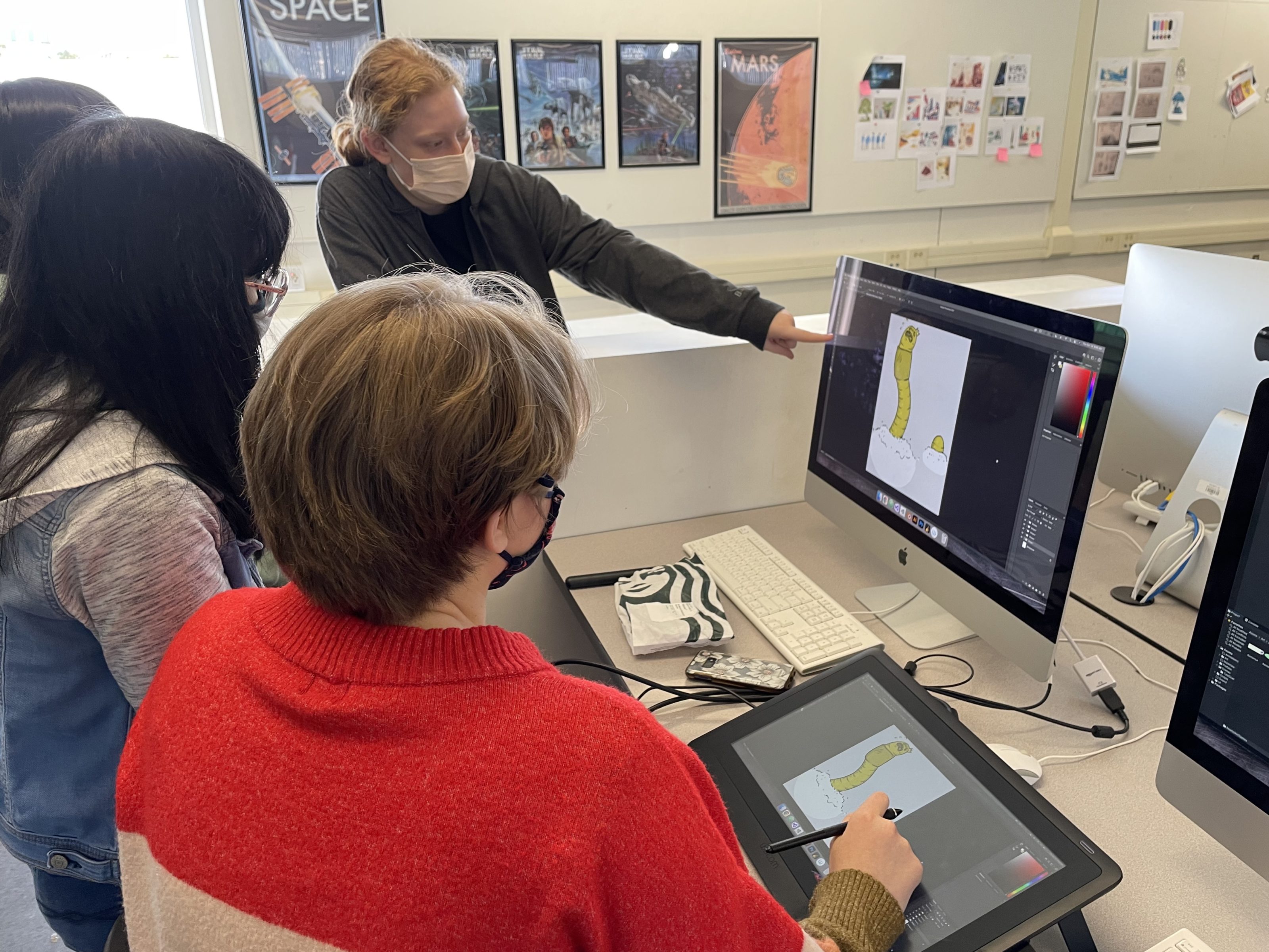 Students in class working with computers