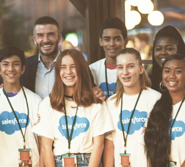 Parnell and her students with British soccer star David Beckham.
