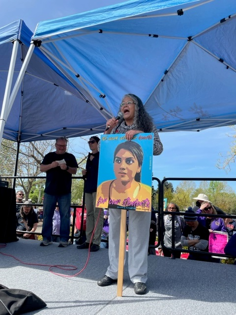 A woman speaks at a rally during the SCTA strike.