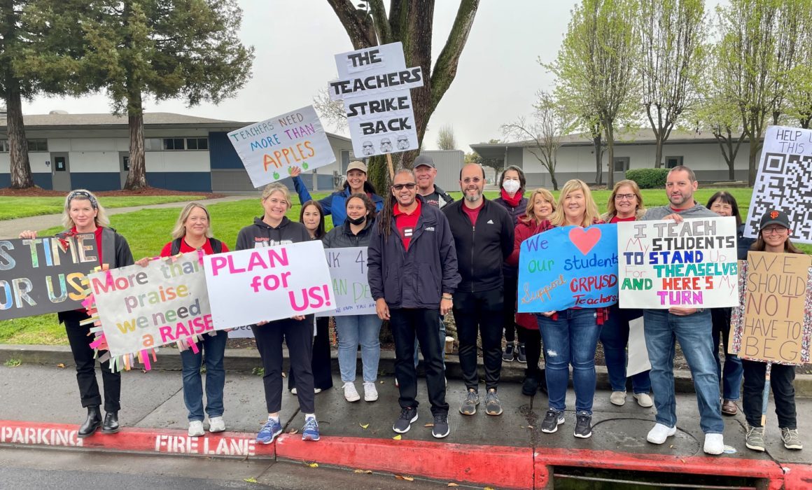 E. Toby Boyd, center, with striking Rohnert Park Cotati Educators Association members.