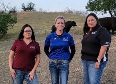 Three teachers at a farm