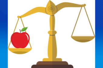 Image of the Scales of Justice with a red apple on the left scale.
