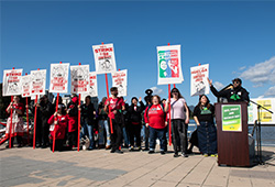 Oakland educators hold "Ready to Strike for a Fair Contract" signs at a Rally on Wednesday, March 15.