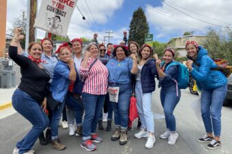A group of people dressed like Rosie the Riveter