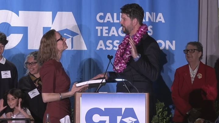 An image of David Goldberg being installed as CTA President at the CTA May 2023 State Council of Education.