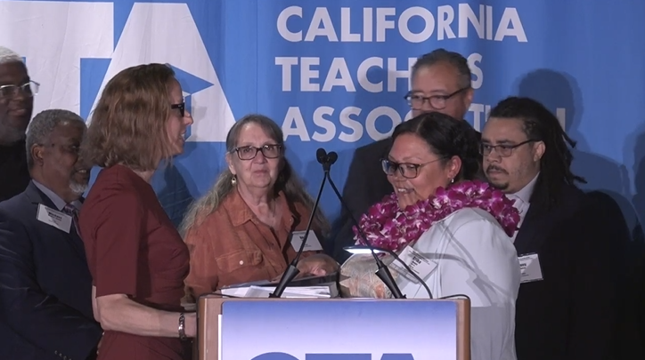 An image of Erika Jones being installed as CTA Secretary-Treasurer at the CTA May 2023 State Council of Education.