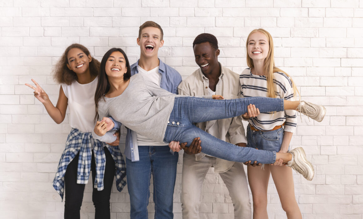 Photo of 5 happy students