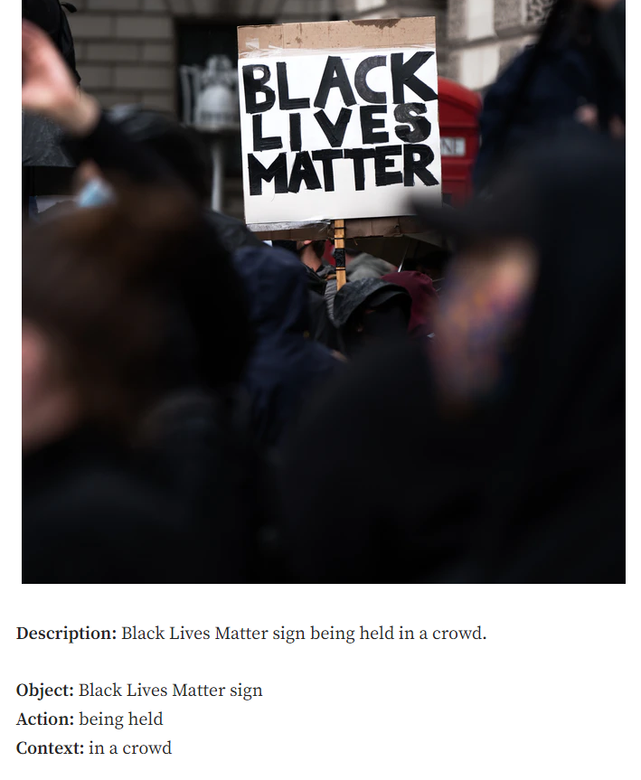 Black Lives Matter sign being held in a crowd.