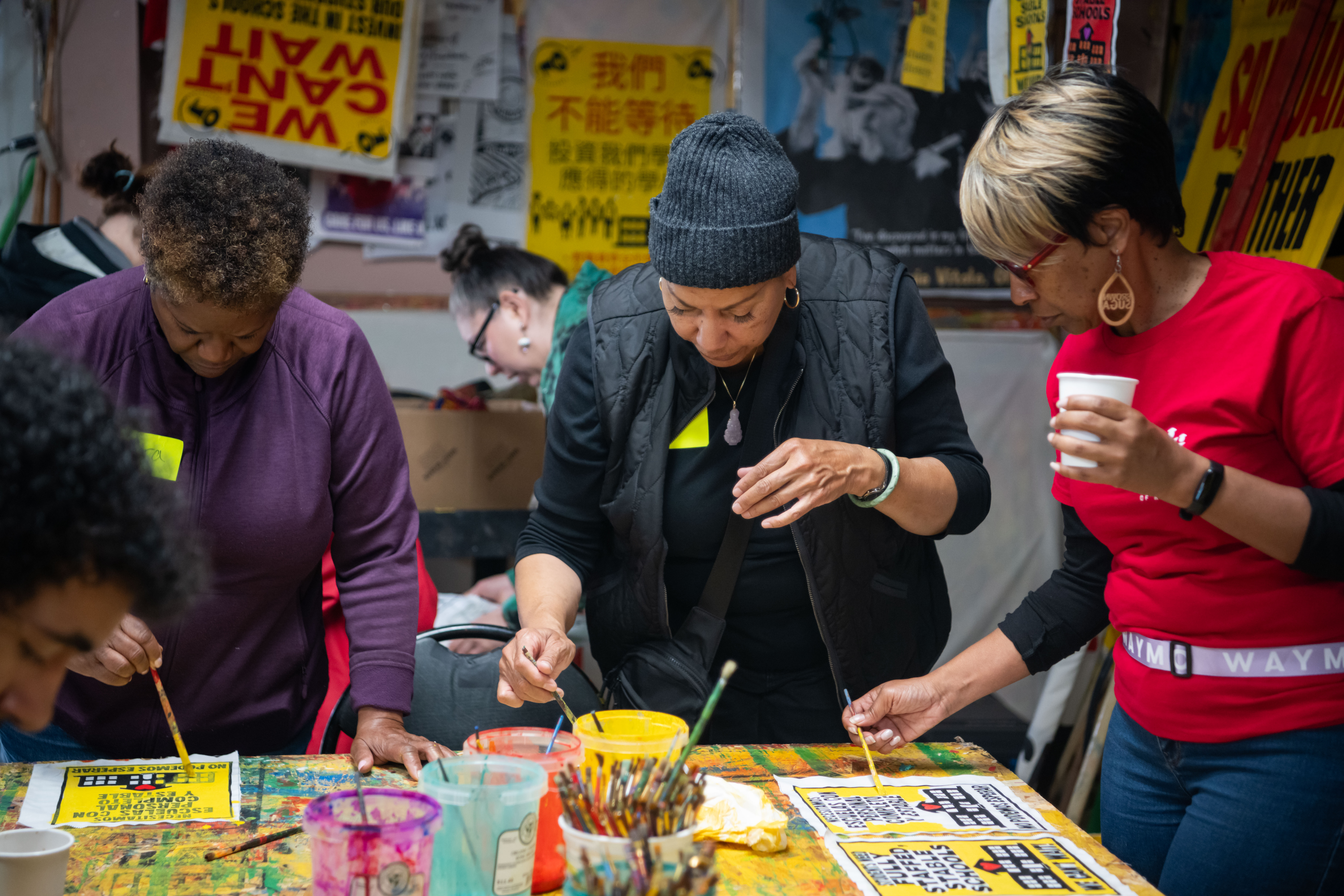 Camaraderie with a cause: Everyone is welcome to join in and paint.